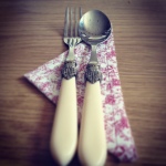 cutlery, napkins, fork, spoon, food